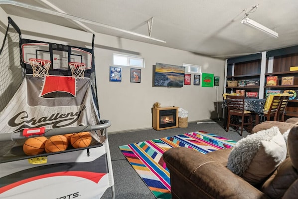 Big Bear vacation rental with hot tub and game room, close to lake, ski resorts, and trails. By Rather Be Properties