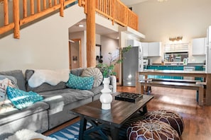 Big Bear vacation rental with hot tub and game room, close to lake, ski resorts, and trails. By Rather Be Properties