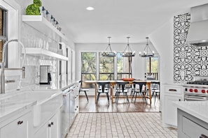 Open kitchen layout with a dining room directly connected for easy entertaining.