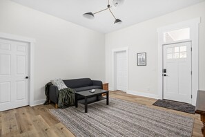 Living Room: Bright and airy space with stylish decor, perfect for unwinding or socializing!