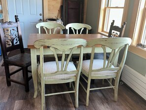 Kitchen table expands to comfortably fit 8 people.