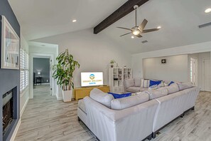 Curl up in the chic living room & stream your favorites on the smart TV