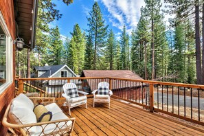 Front porch seating—an ideal spot for morning coffee amidst nature.
