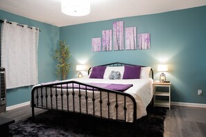 Welcome to your cozy retreat: a king-sized bed draped in warmth, surrounded by decor that turns every evening into a cozy escape. The flickering lamps add a touch of magic, perfect for unwinding and dreaming.
