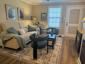 Comfortable living space with reclining sofa, including 2 built in USB ports