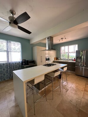 Kitchen with island, convection oven, dishwasher