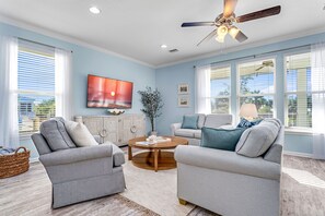 Living area includes a sleeper sofa.