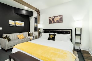 Bright and airy bedroom with a world map print and a striking color palette.