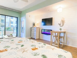 Beautifully updated unit featuring a large flat screen TV + electric fireplace!