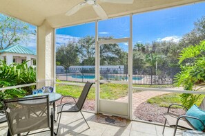 The screened porch overlooking the pool will be a favorite spot for morning coffee and afternoon chats.
