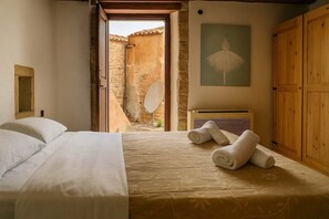 Wake up to sunlight and old-town views
