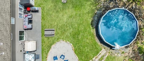 Your ultimate summer escape—right in the backyard! ☀️ Enjoy the heated pool, relaxing sauna, hot tub, fire pit, outdoor games, and comfy lounge areas. Everything you need for fun, sun, and unforgettable memories!