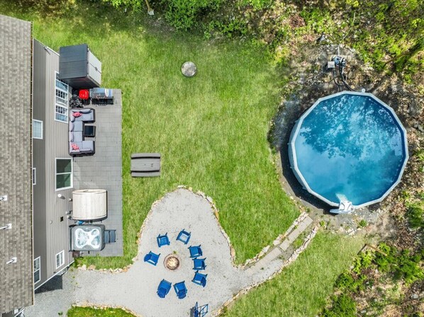 Your ultimate summer escape—right in the backyard! ☀️ Enjoy the heated pool, relaxing sauna, hot tub, fire pit, outdoor games, and comfy lounge areas. Everything you need for fun, sun, and unforgettable memories!
