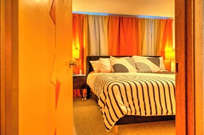 A warm and inviting space with a king-sized memory foam bed.
