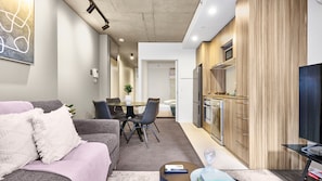 Sleek wooden finishes and cozy urban living space