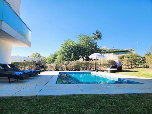 Soak up the sun and unwind in our private pool and yard.