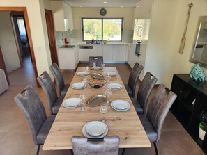 Gather around the table! Our indoor dining area comfortably seats 8.