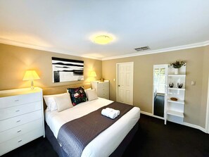 King bed main primary room with semi-ensuite and wardrobe