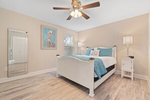 Feel right at home in the cozy and charming queen bedroom.