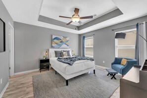 Comfortable bed with a reading nook with a fan and night light for convenience