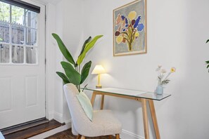 Workspace with comfortable chair and glass desk