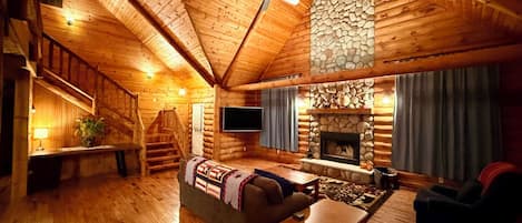 Living Room w Lofted Wood Beam Ceilings