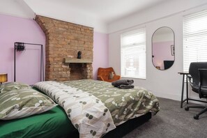 Bedroom 1:

Features:
- 1 x Superking Bed
- Garment Hanger Space
- Work Desk
