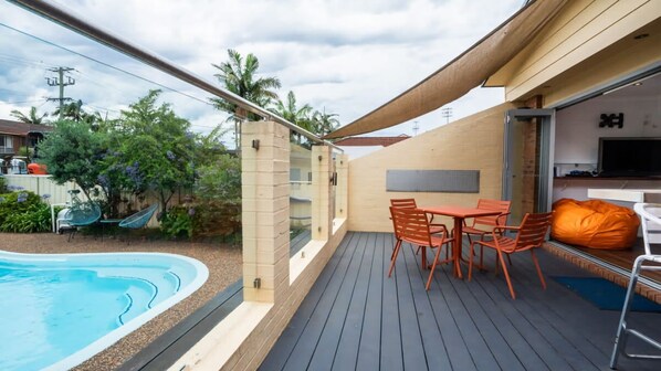 Enjoy meals or cocktails in the fresh air, with stunning views of the pool