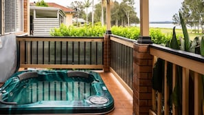 Unwind in the hot tub while enjoying the serenity of the outdoors