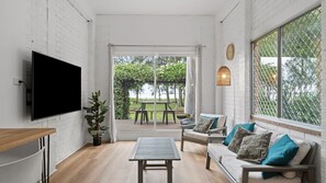 A spacious living area in the private studio suite, designed for relaxation and comfort.
