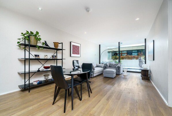 Open, spacious living and dining area with modern design.