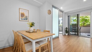 Wooden accents for cozy, stylish meals.