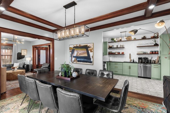 Open kitchen and dining room with 12 seats.