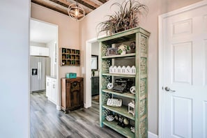 The front entryway welcomes you with a beautifully curated selection of tasteful decorations, setting the stage for an inviting and memorable stay.