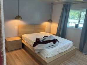Bedroom 4, queen-size bed, linens, 43" Roku TV, wardrobes and nightstands 