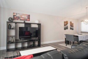 Not pictured: Space has been upgraded to two couches!