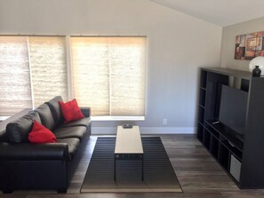 Not pictured: Space has been upgraded to two couches!
