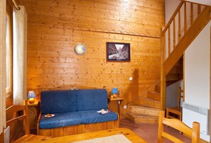 Welcome to our cozy and warm ski-in/ski-out chalet in La Plagne Soleil!
