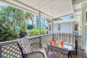 Outside Images of front porch.  Perfect for sipping beverages and great conversation.