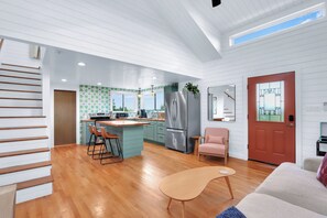 Open floor plan with living.  View from the living room looking at the kitchen.
