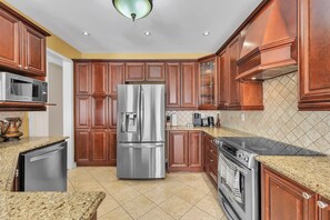 Stainless steel appliances with all basic kitchen needs for preparing meals!
