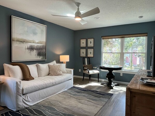 Inviting living space with a queen sofa bed, perfect for relaxing evenings.