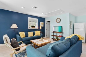 Experience a cozy and comfortable space in the carriage house, perfect for relaxation and a peaceful retreat.