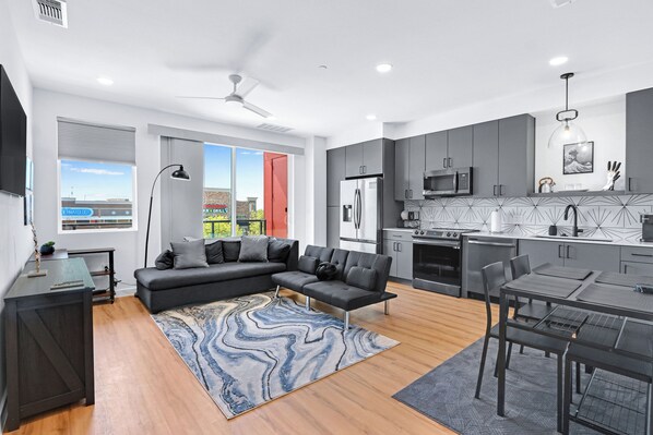 Curl up in the chic living room & stream all your favorite entertainment