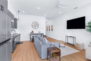 Unwind in the living room & stream your favorites on the smart TV