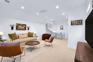 Unwind with a movie or get competitive with a round of hoops in the loft!