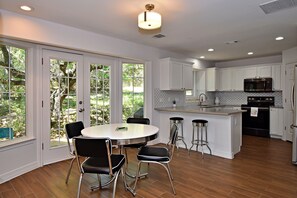 Sip morning coffee or grab a bite at the kitchen counter, with seating for 4