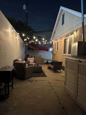 Backyard, BBQ, a cooler, Lounge chairs, a day bed, and a heater!

Washer and Dryer in the shed