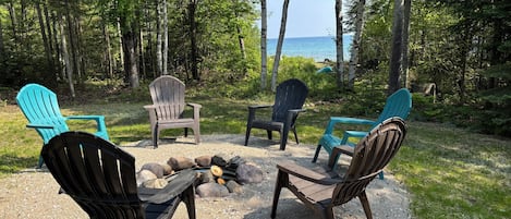 Firepit in private front yard with beautiful views of Lake Huron.