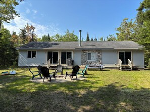 Single level home with decks off living room and master overlooking Lake Huron.